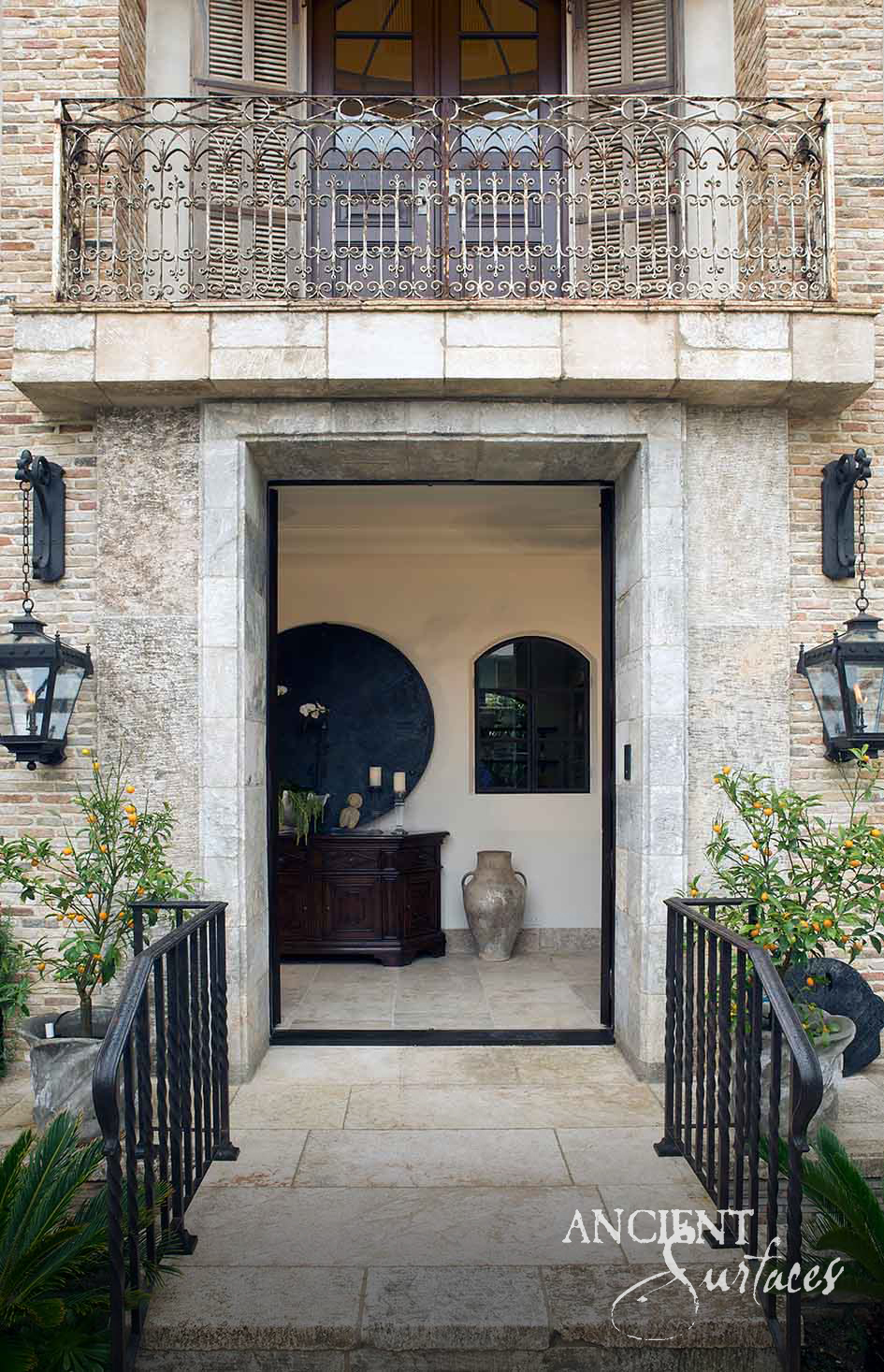 Long format reclaimed limestone plank flooring with natural fossil detail